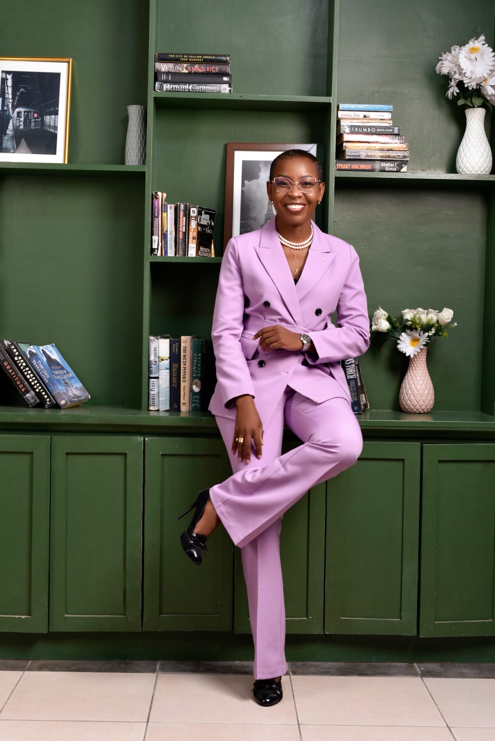 Eunice Ireri — Emerald suit — studio portrait