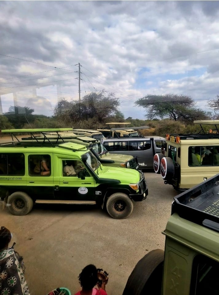 Tour vans lined up at the Amboseli National Park Kimana Gate