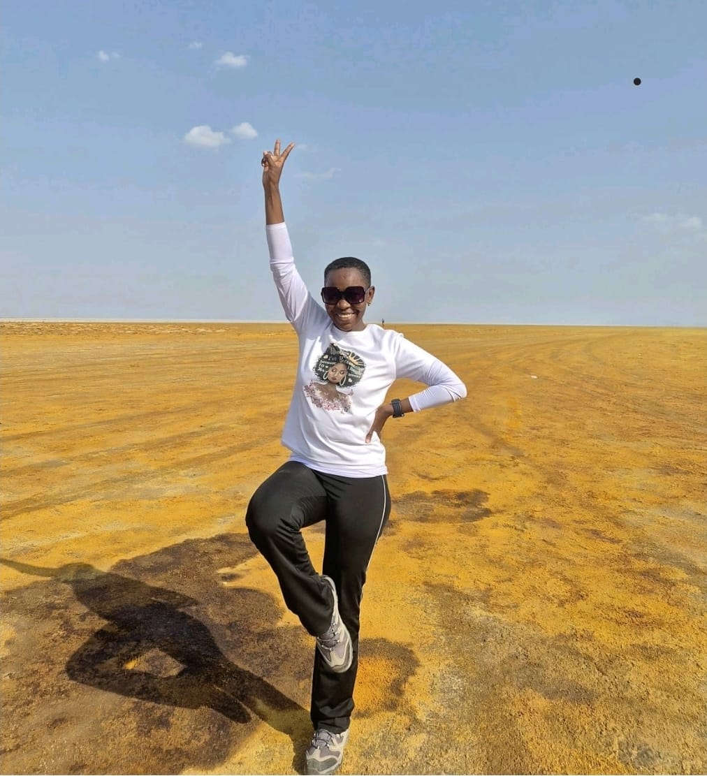 Standing on the yellow salt plains on the way to Dallol